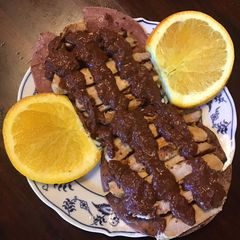 A picture of California Farm Pork Chops Mole Sauce Tortillas.
