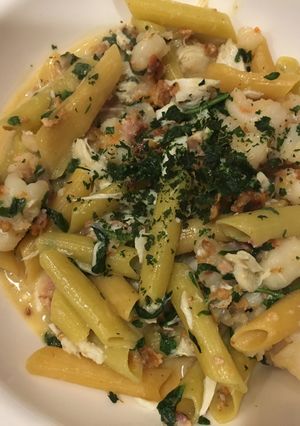 A picture of Crispy Pepper Seafood Scampi over Red & Green Lentil Penne.