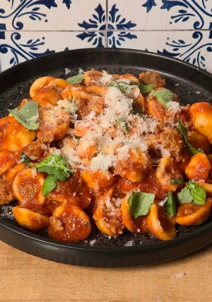 A picture of Orrechiette with Sausage & Tomato Sauce (Orrechiette con Salsiccia al Pomodoro).