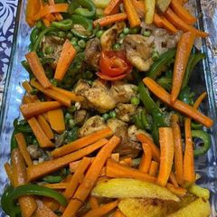 A picture of Steam chicken with steamed veggies.