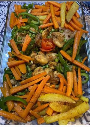 A picture of Steam chicken with steamed veggies.