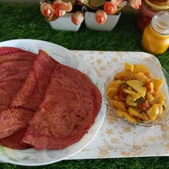 A picture of Beetroot oats dosa.