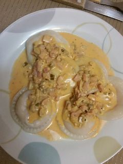 Una foto de Sorrentinos con salsa
