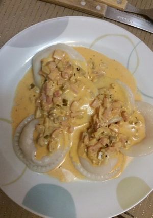 Una foto de Sorrentinos con salsa