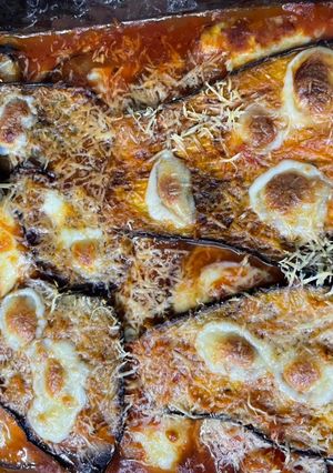 Una foto de Berenjenas a la parmesana