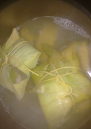Una foto de Tamales de carne y humita
