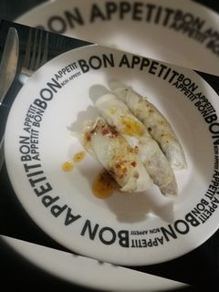 Una foto de Niños envueltos en hoja de repollo
