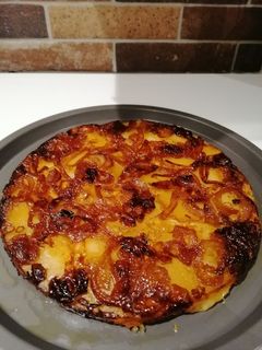 Une photo de Tatin de pommes de terre aux oignons confits