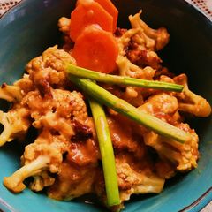 A picture of Sweet and spicy cauliflower with creamy custard sauce.