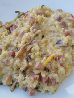Una foto de Risotto verduras y jamón