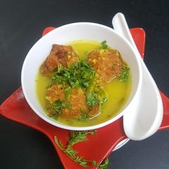 Dal bonda with soup A picture of Dal bonda with soup.