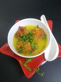 A picture of Dal bonda with soup.