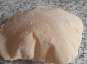 Una foto de Pan pita o pan árabe