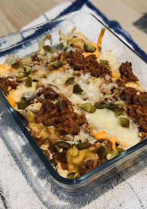A picture of Mexican Nachos with Ground Beef.