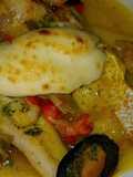 Merluza en salsa marinera i alioli al grill