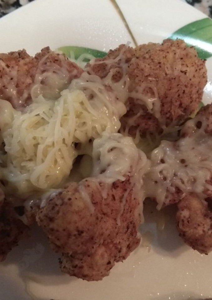 Una foto de Coliflores rebozadas con queso