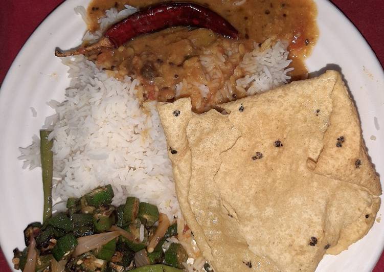 Dal fry fried bhindi papad and plain rice
