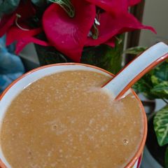 A picture of Moong dal tomato carrot soup.