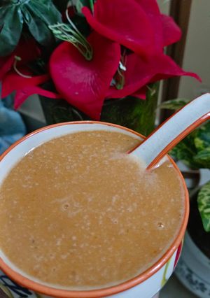 A picture of Moong dal tomato carrot soup.