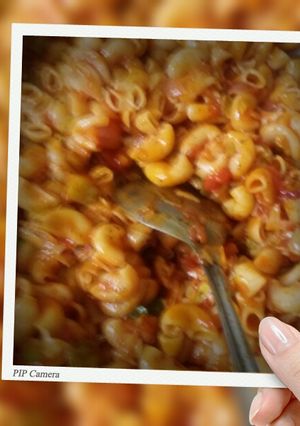 A picture of Red gravy pasta.