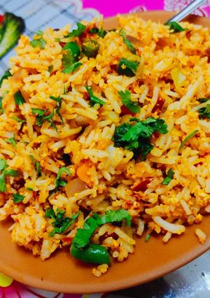 A picture of Egg bhurji schezwan fry rice.