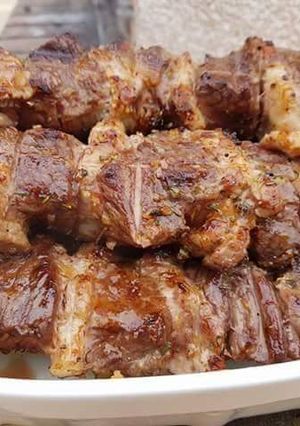 Une photo de Brochette de boeuf a la pancetta