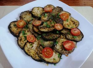 Foto principal de Berenjenas al horno con miel y tomate cherry