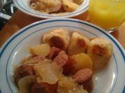 A picture of kielbasa and sauerkraut