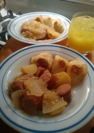 A picture of Sauerkraut and polish kielbasa.