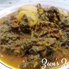 Hyderabadi Aloo Suvaa Paalak Gosht A picture of Hyderabadi Aloo Suvaa Paalak Gosht.