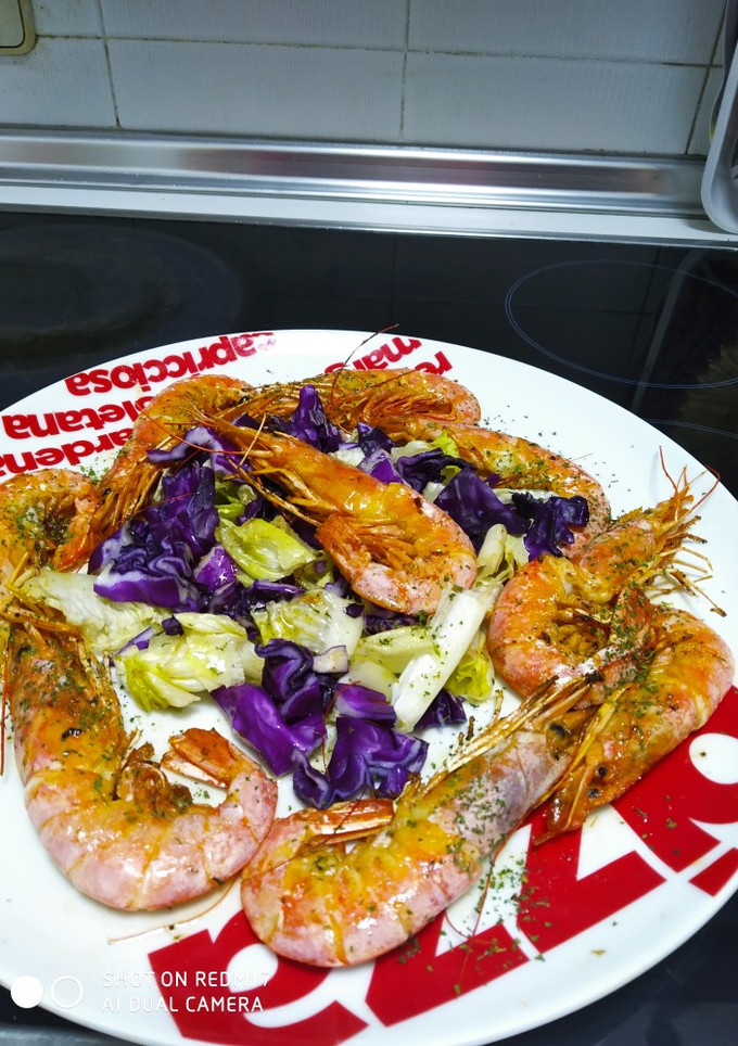 Una foto de Langostinos a la plancha con eneldo