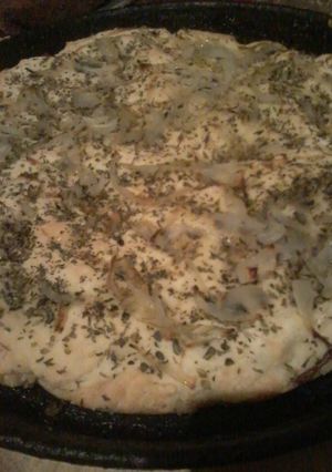 Una foto de Pizza rápida de cebolla