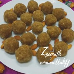 A picture of Wheat Flour and Jaggery Laddoos.