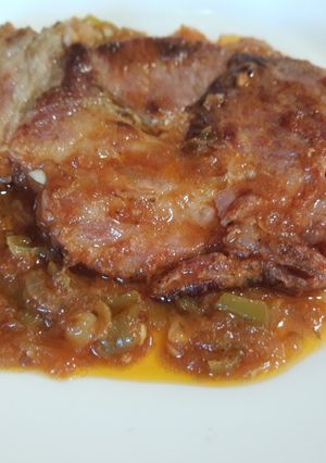 Una foto de Chuleta de lomo ahumado en salsa