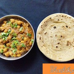 Chole with lachha paratha A picture of Chole with lachha paratha.
