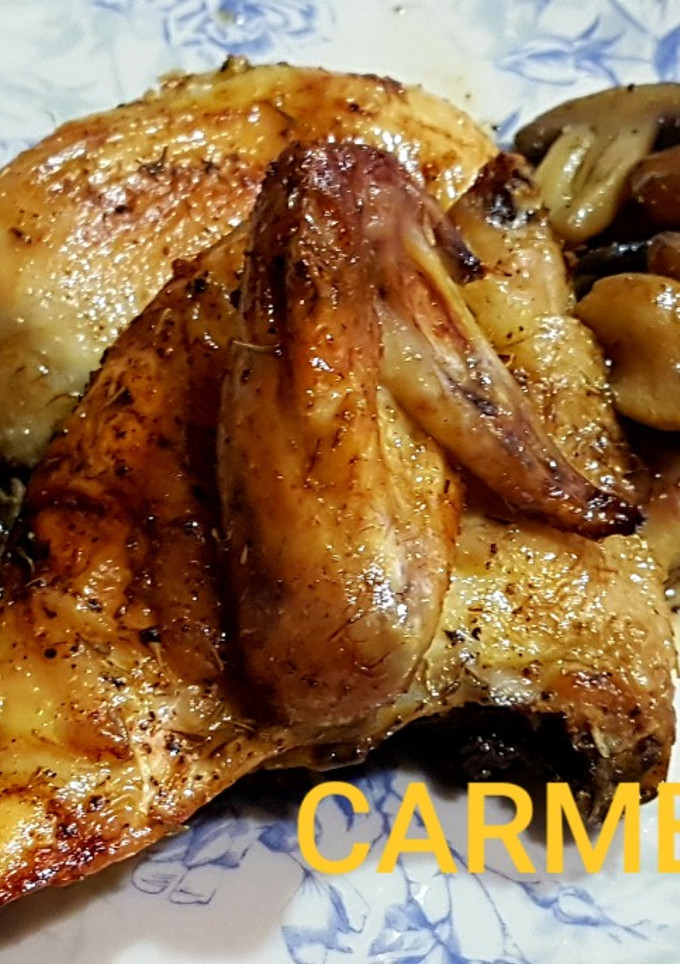 Una foto de Pollo con setas a la naranja