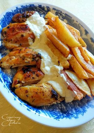 Una foto de Churrasco de pollo al curry madrás con salsa a las dos pimientas