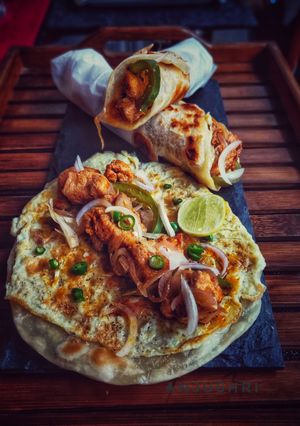 এগ চিকেন কাঠি রোল(Egg chicken kathi roll recipe in Bengali) রেসিপির প্রধান ছবি