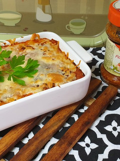 Una foto de Canelones vegetarianos con soja y pesto rojo