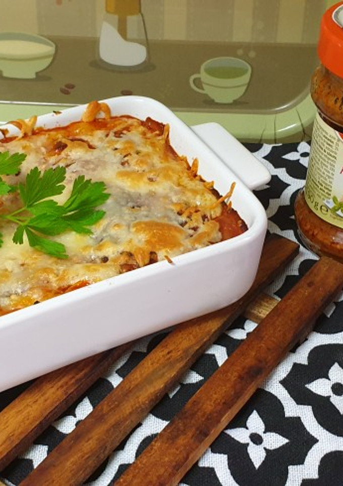 Una foto de Canelones vegetarianos con soja y pesto rojo