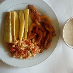 A picture of Fried yam,plantain and scrambled eggs with oats.