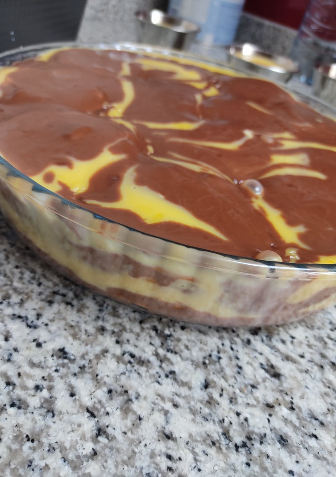 Una foto de Tarta de galletas, chocolate y flan 😍❤️