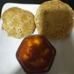 Masala puri and aloo sabji A picture of Masala puri and aloo sabji.