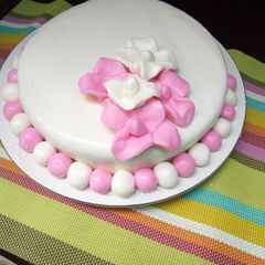 A picture of Pineapple cake with fondant icing.