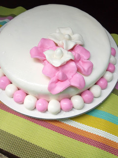 A picture of Pineapple cake with fondant icing.