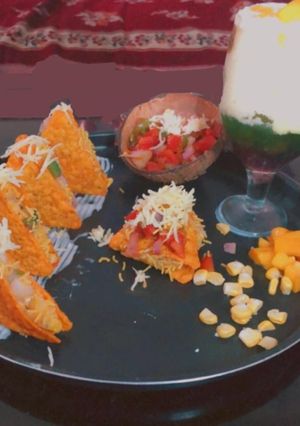 A picture of Cruchy triangles with salsa.