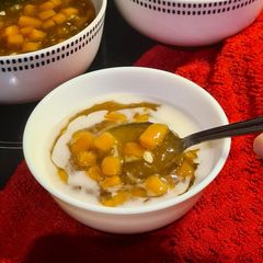 A picture of Sweet-Potato Tapioca Porridge with Coconut Sauce.