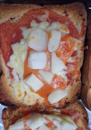 Una foto de Pan lactal tipo pizza de palmito