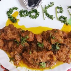 A picture of Mutton masala dhuwan gosht.