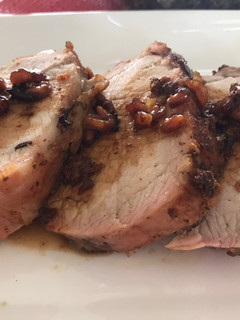Una foto de Lomo de cerdo con salsa de granada